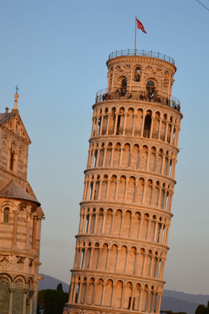 Crafting Captivating Headlines: Your awesome post title goes here Captivating view of the Leaning Tower of Pisa during sunset in Italy.